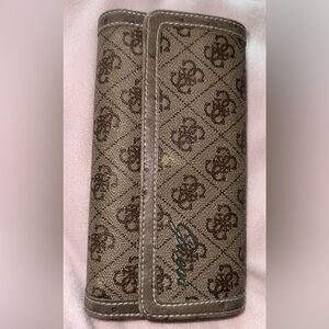 Guess wallet made of eco ostrich leather with a monogram ‘G’ logo pattern